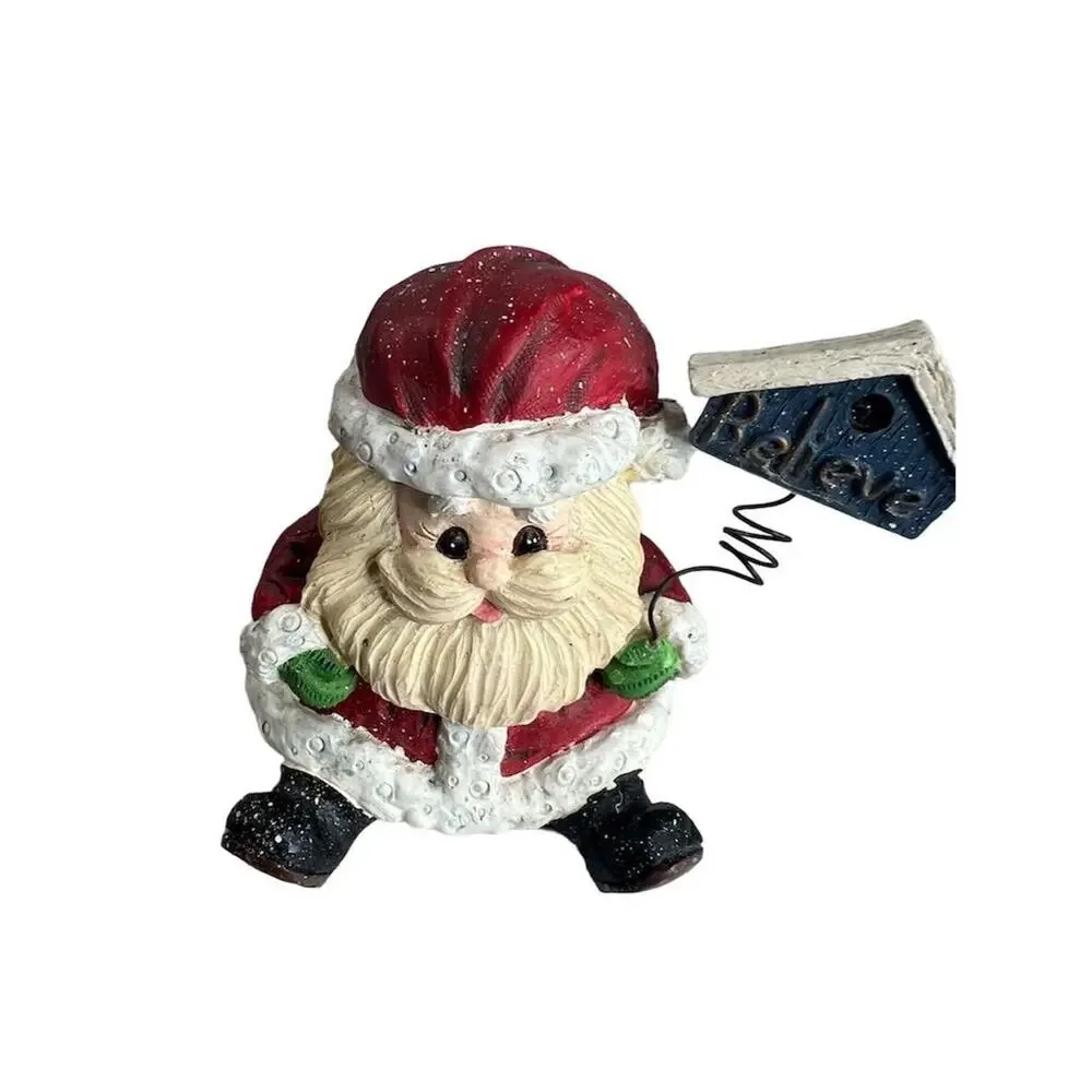 A Berry Merry Christmas Santa Claus Figurine 3